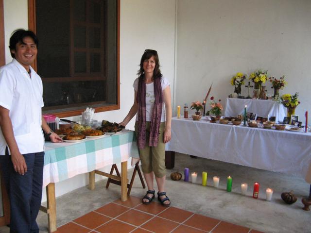 Tour guide Erik Solis and owner of Sacred Earth Journeys Helen Tomei set out the traditional Mayan dishes for the feast.